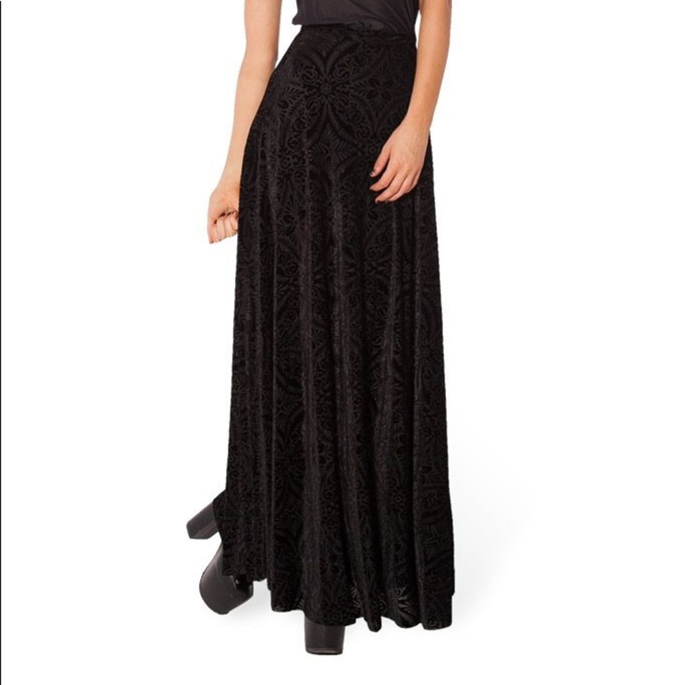 Velvet black maxi skirt. With slit on side